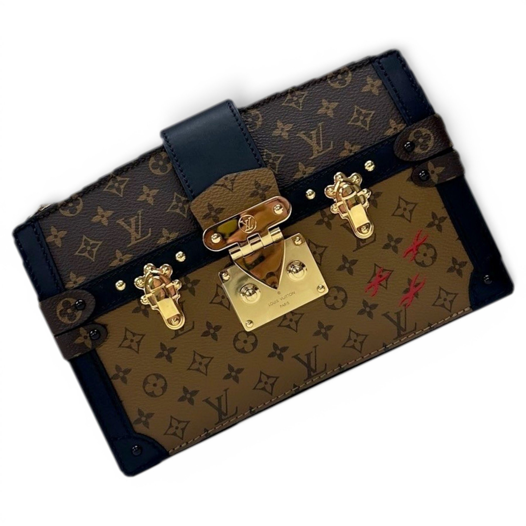 Pochette Trunk leather handbag