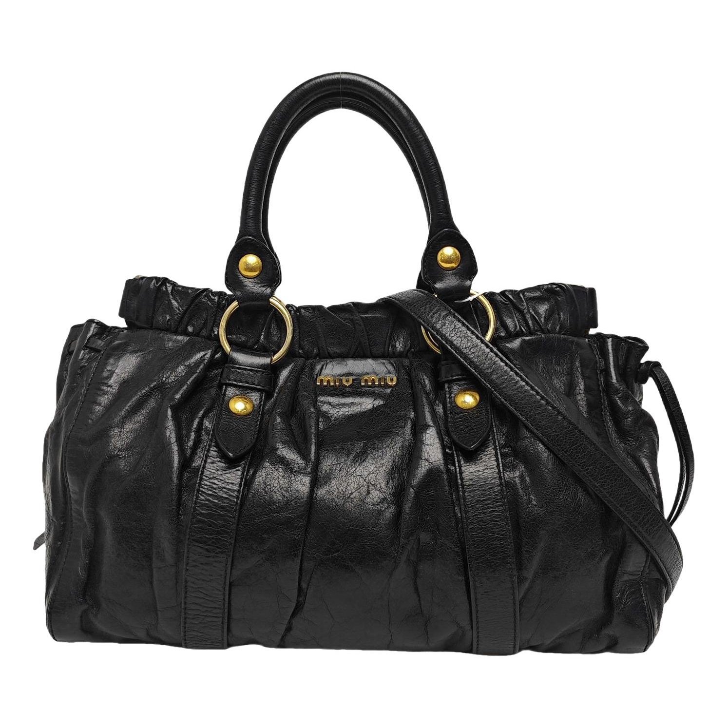 Bow bag leather handbag