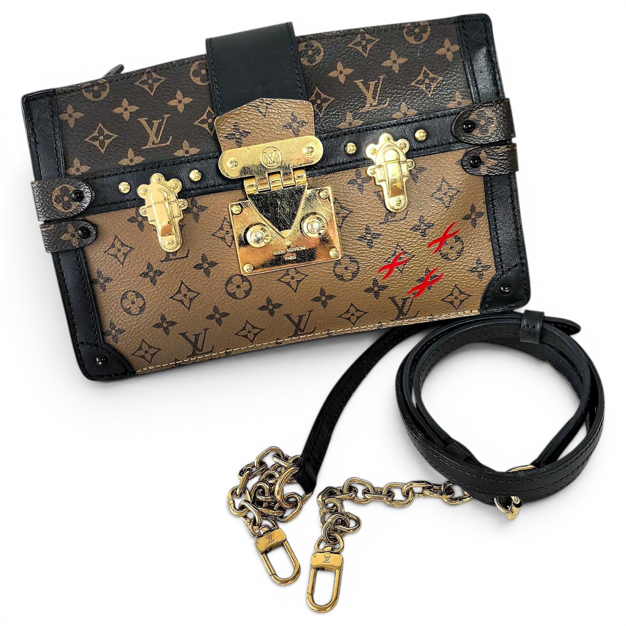 Pochette Trunk leather handbag