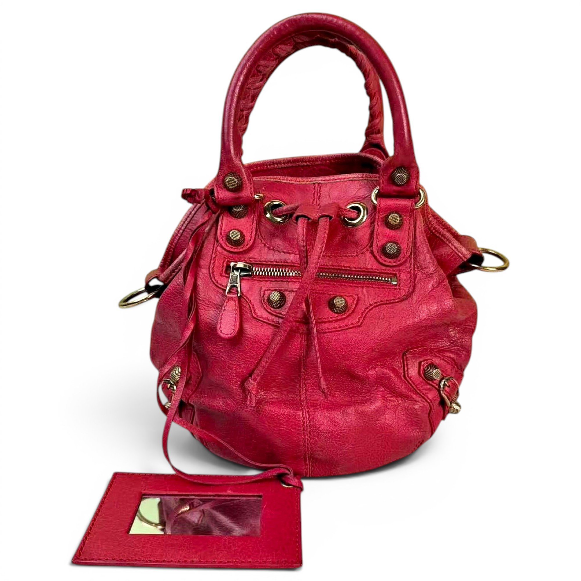 Pompon leather handbag