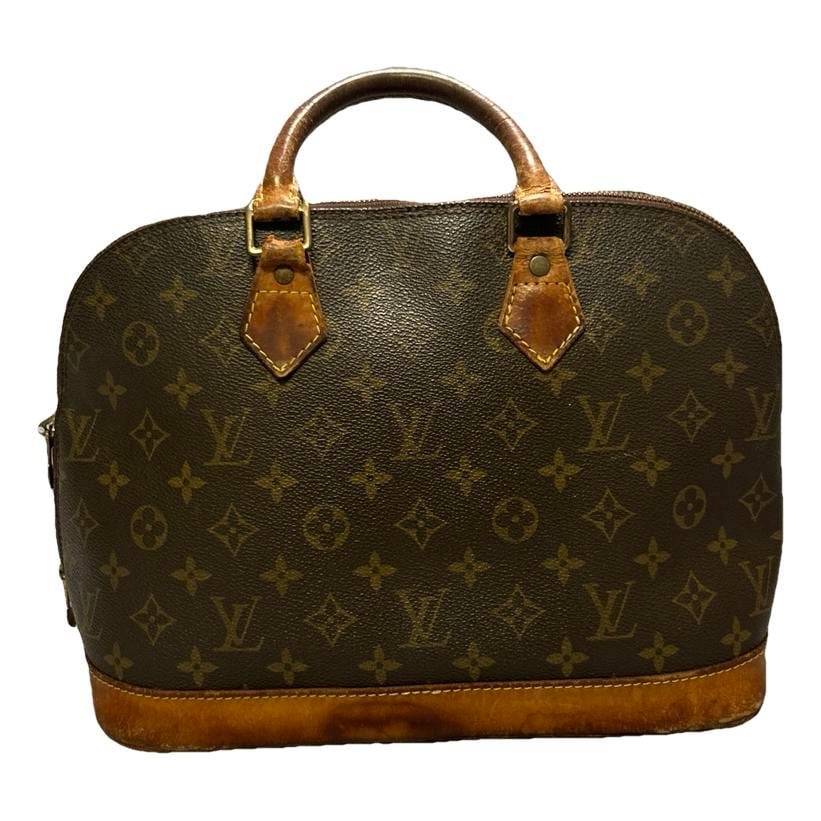Louis Vuitton Alma leather handbag