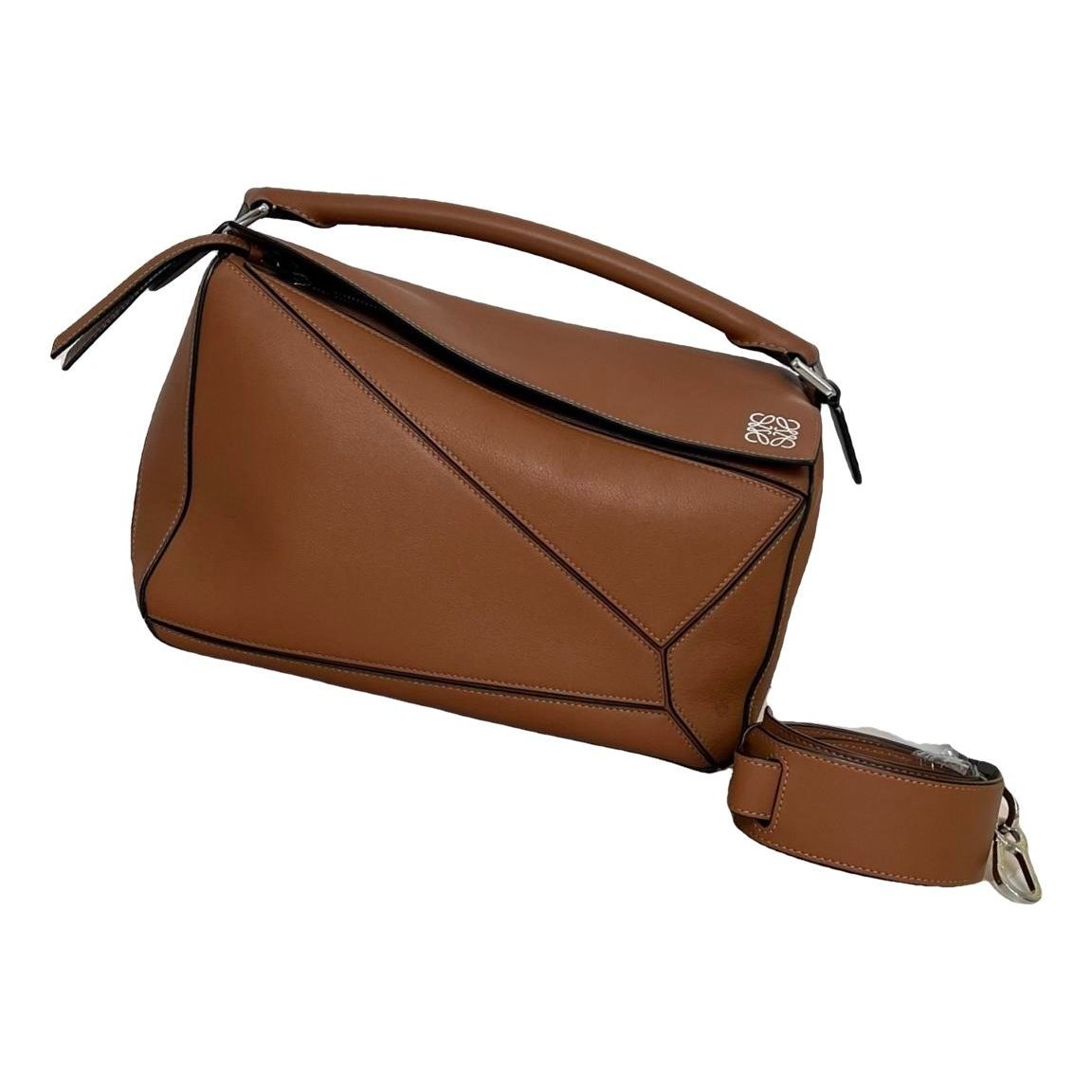Puzzle leather handbag