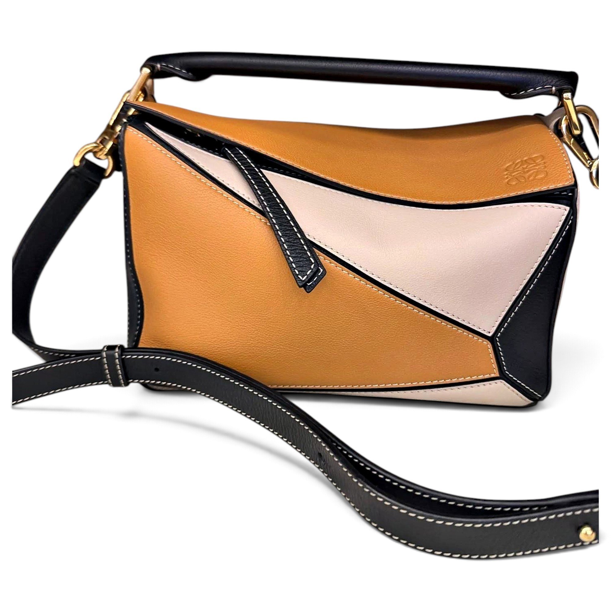 Puzzle leather crossbody bag