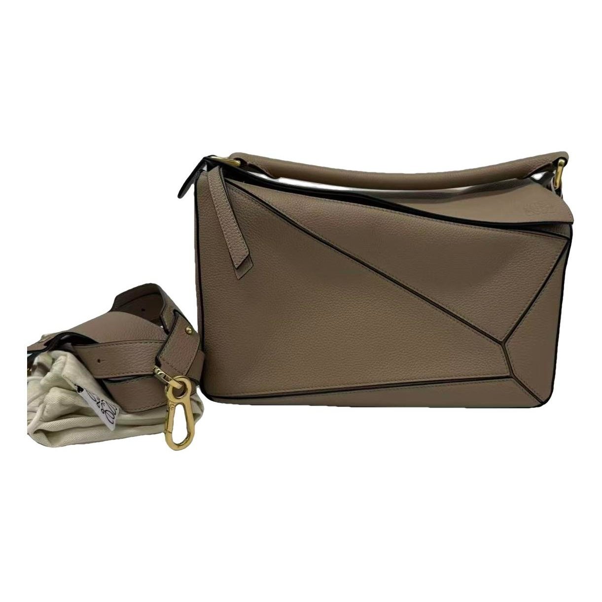 Puzzle leather handbag