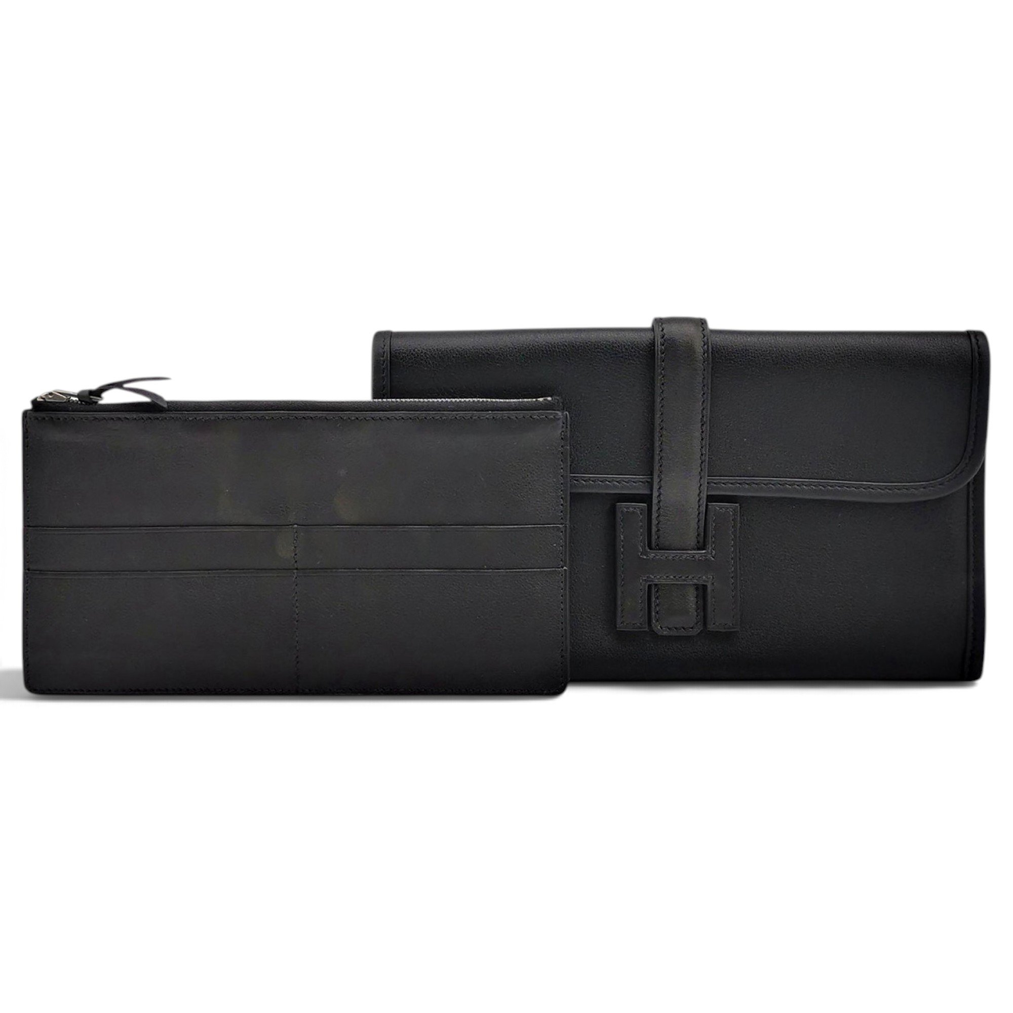 Jige leather clutch bag