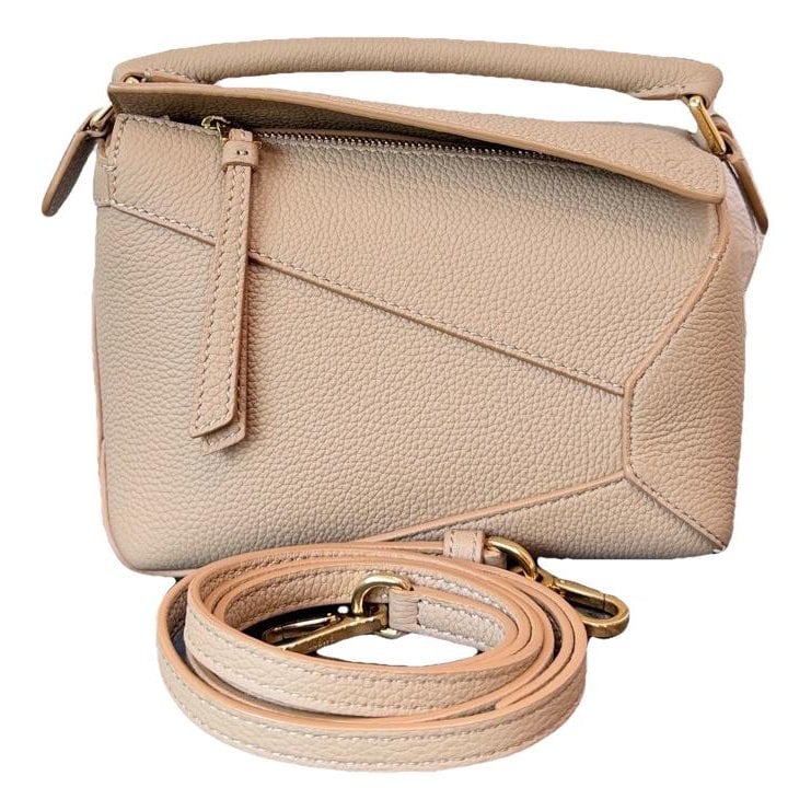 Puzzle leather handbag