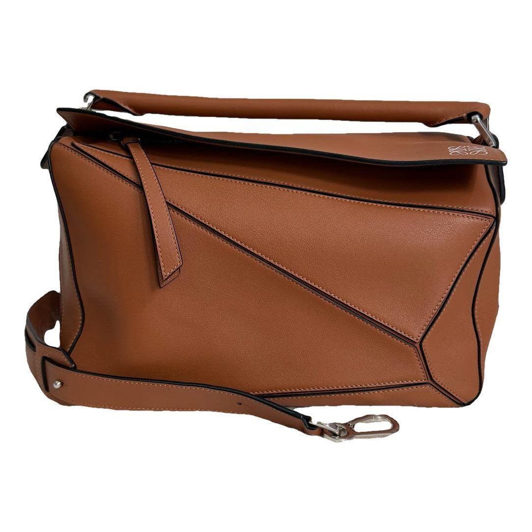 Puzzle leather handbag