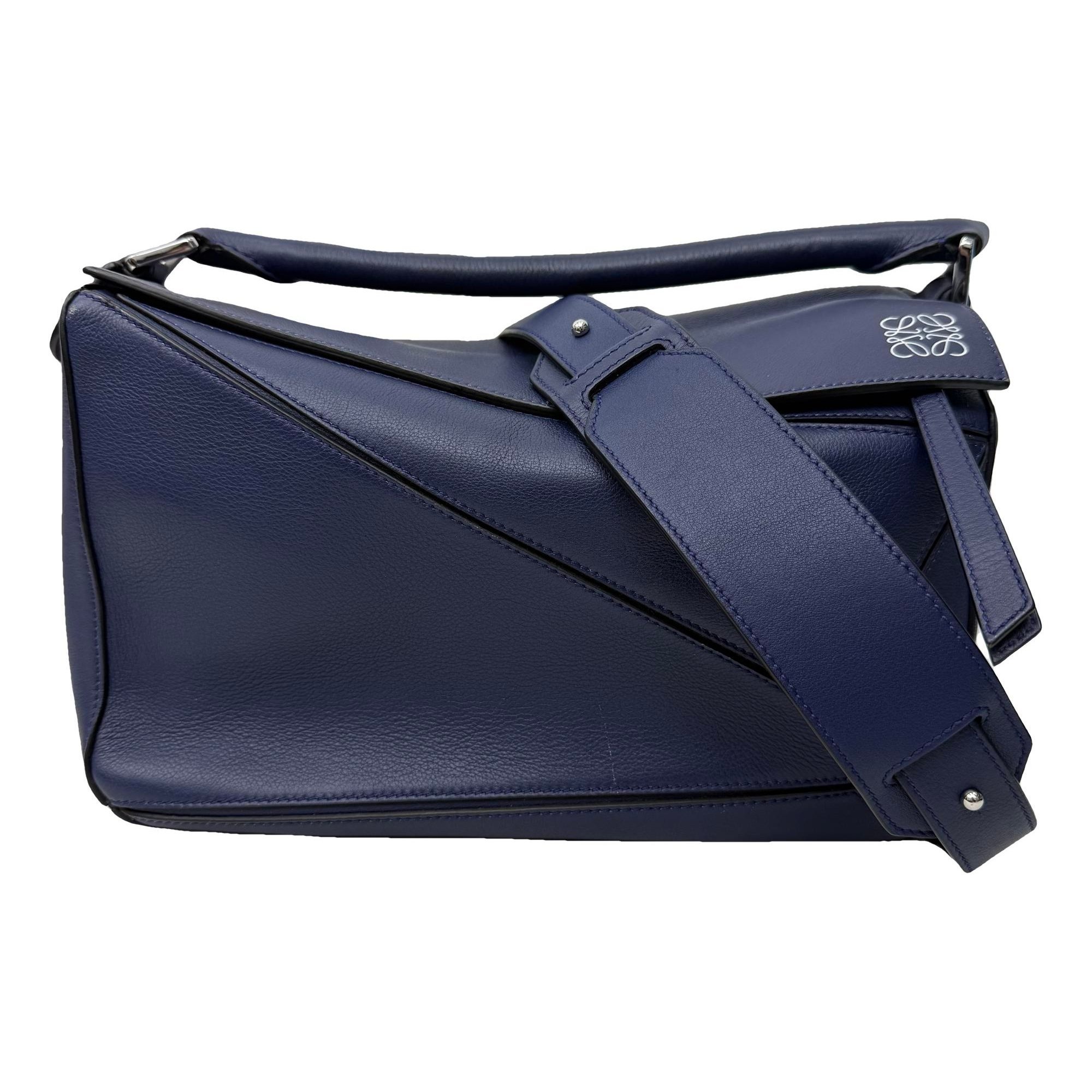Puzzle leather handbag