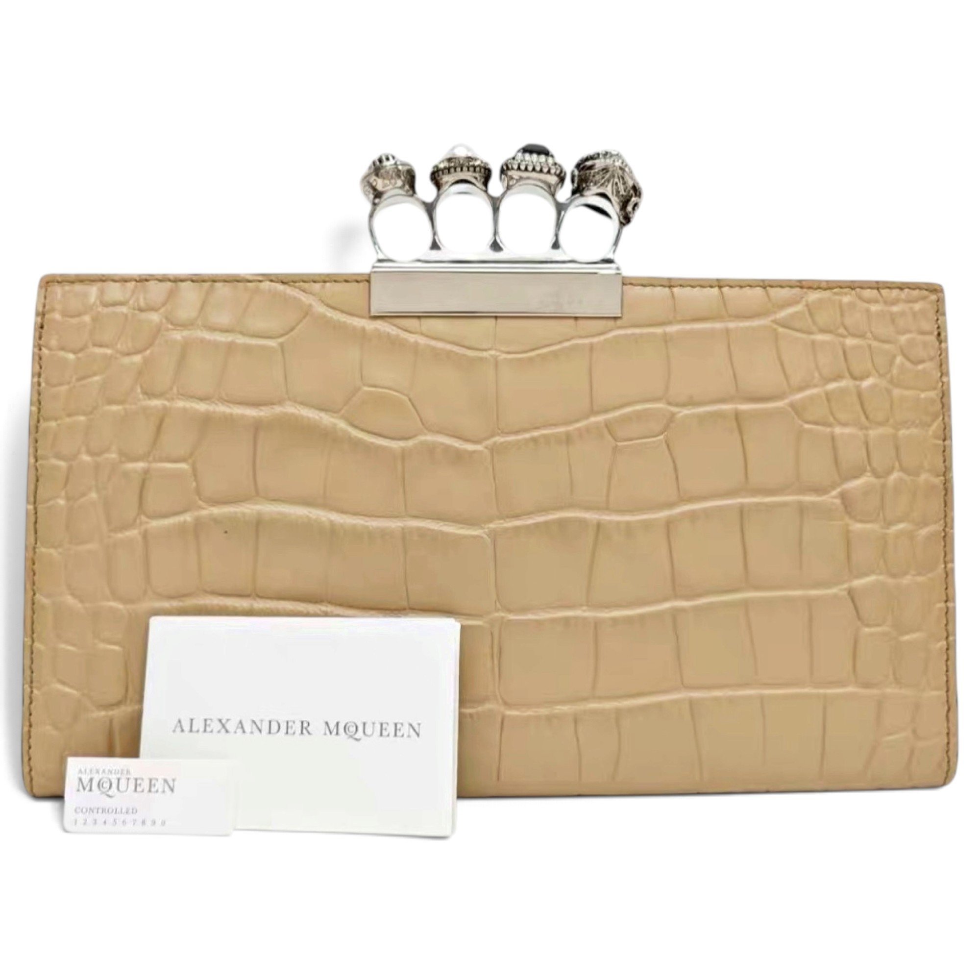 Knuckle leather clutch bag
