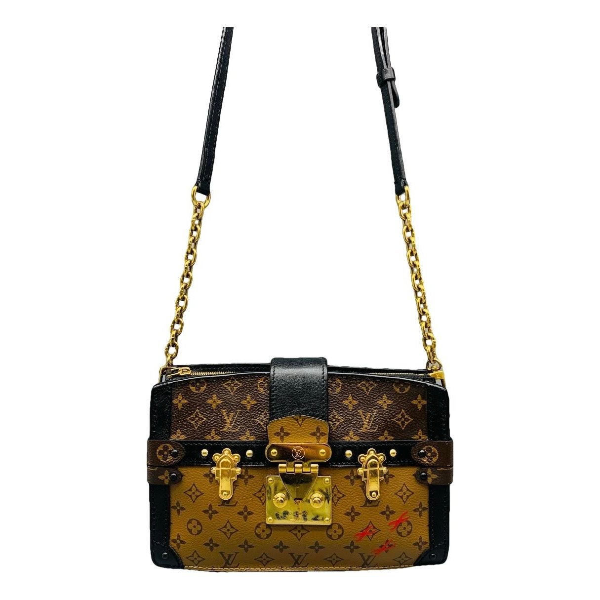 Pochette Trunk leather handbag