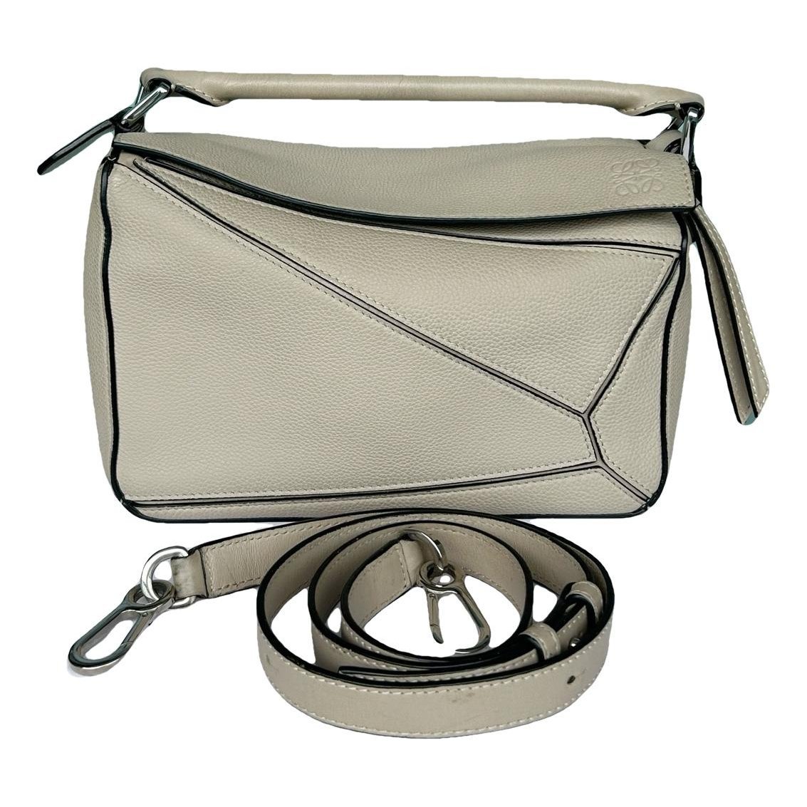 Puzzle leather handbag
