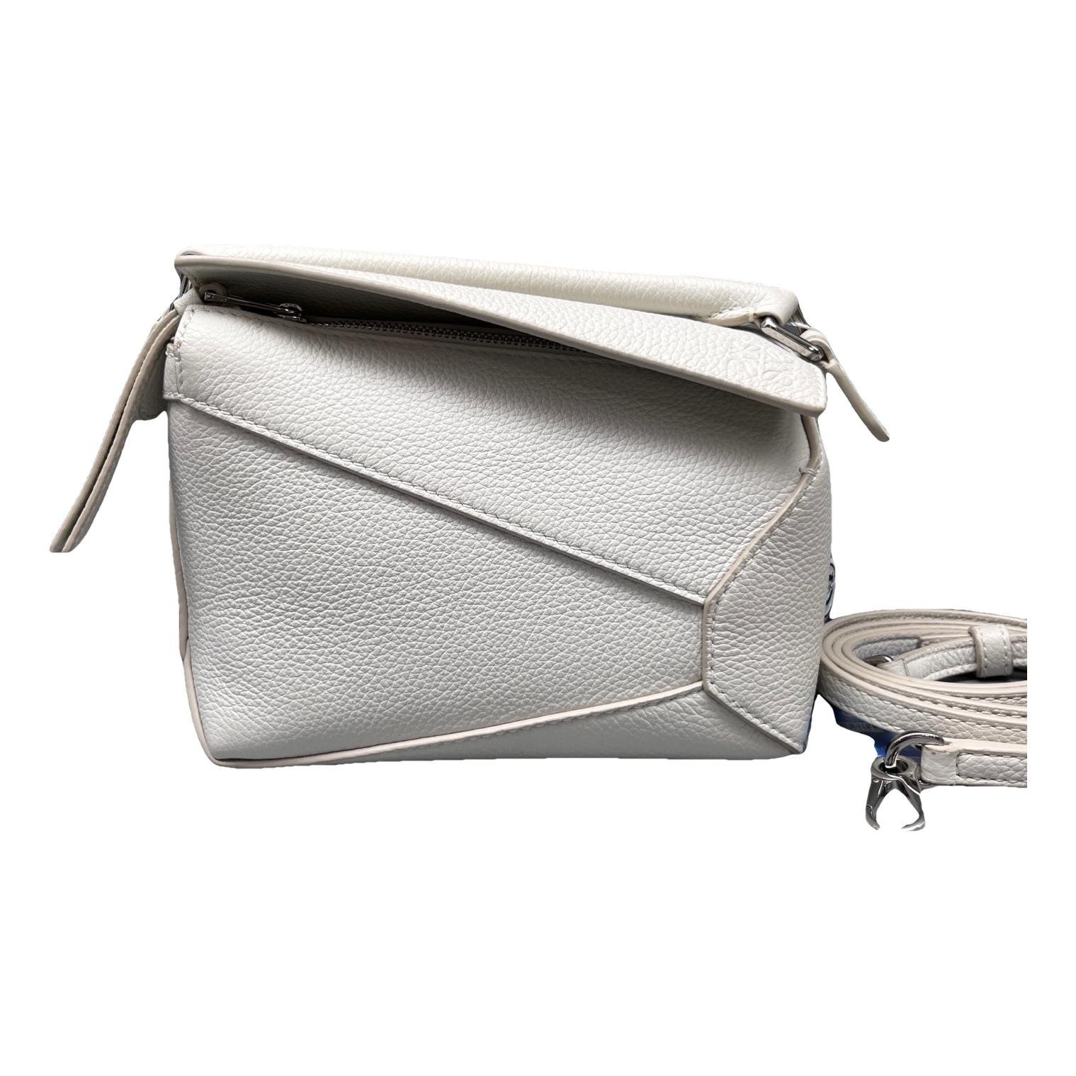 Puzzle leather handbag