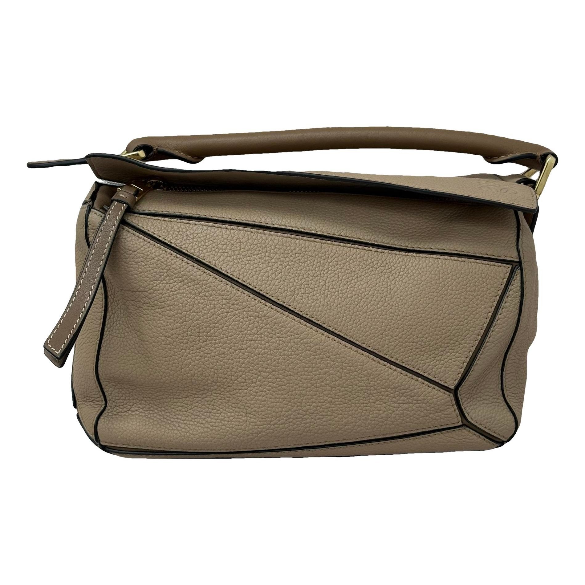 Puzzle leather handbag
