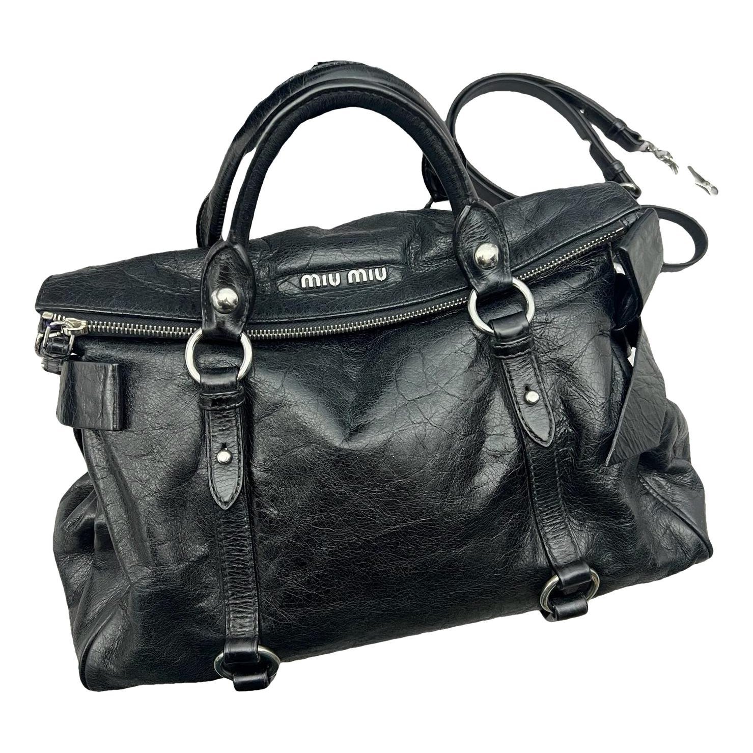 Bow bag leather handbag
