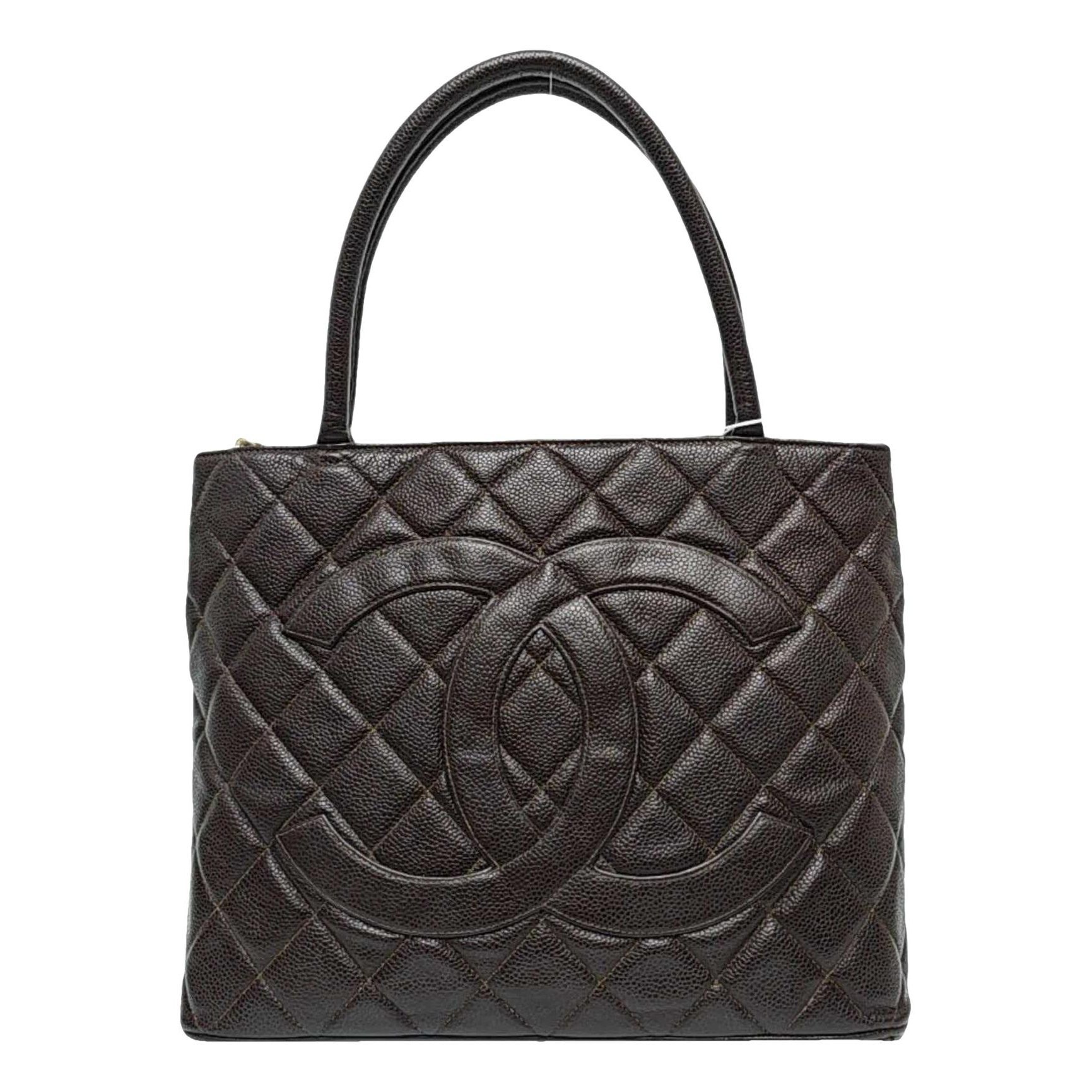 Médaillon leather handbag