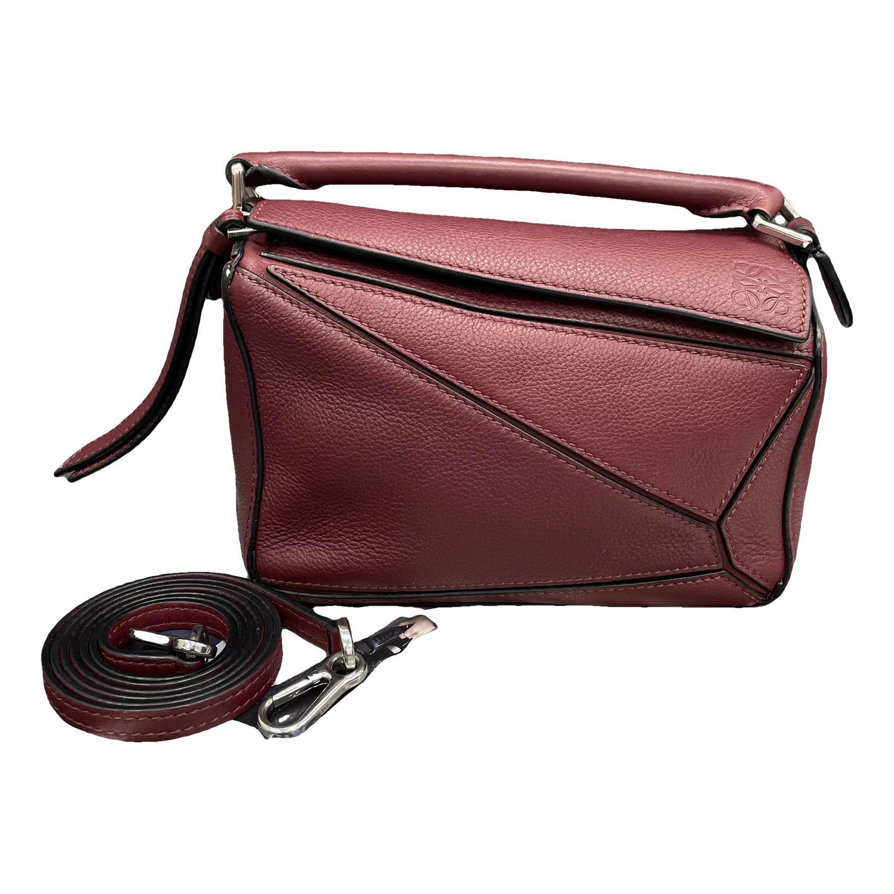 Puzzle leather handbag