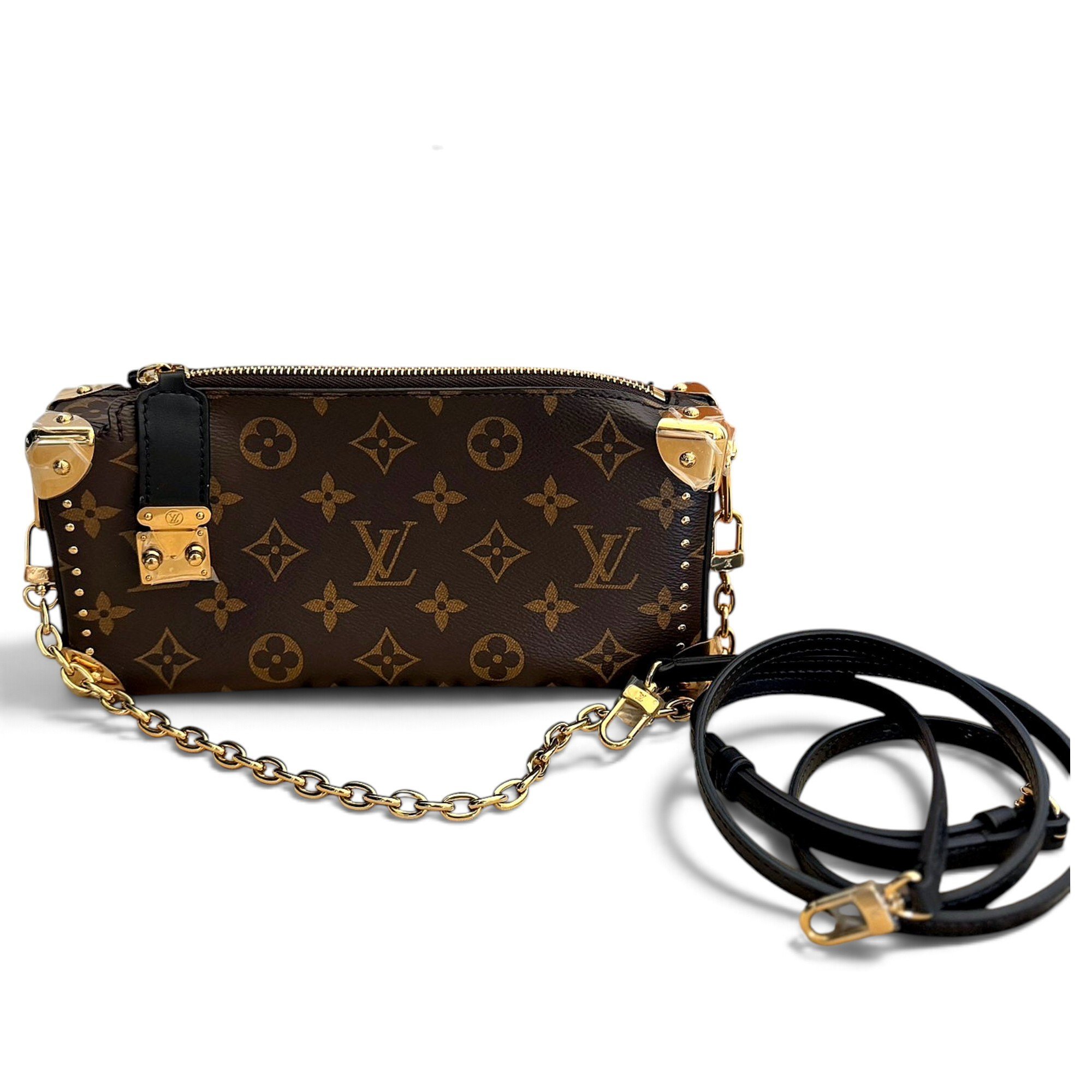 Pochette Trunk leather handbag