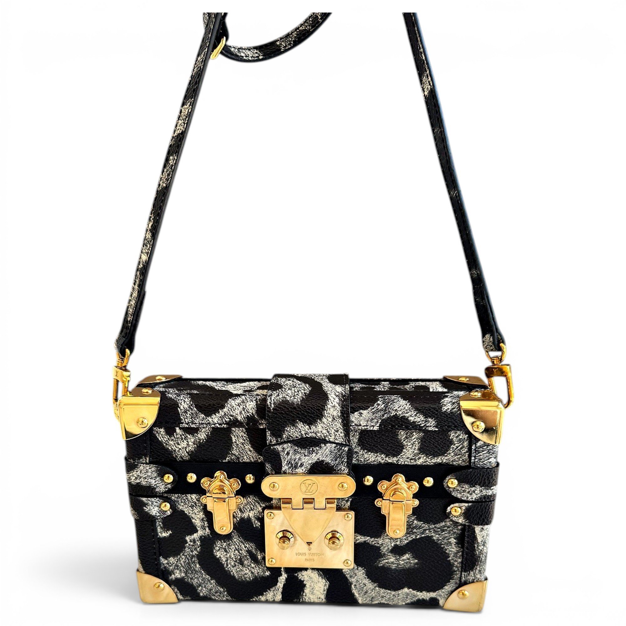 Pochette Trunk leather handbag
