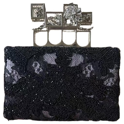 Knuckle leather clutch bag