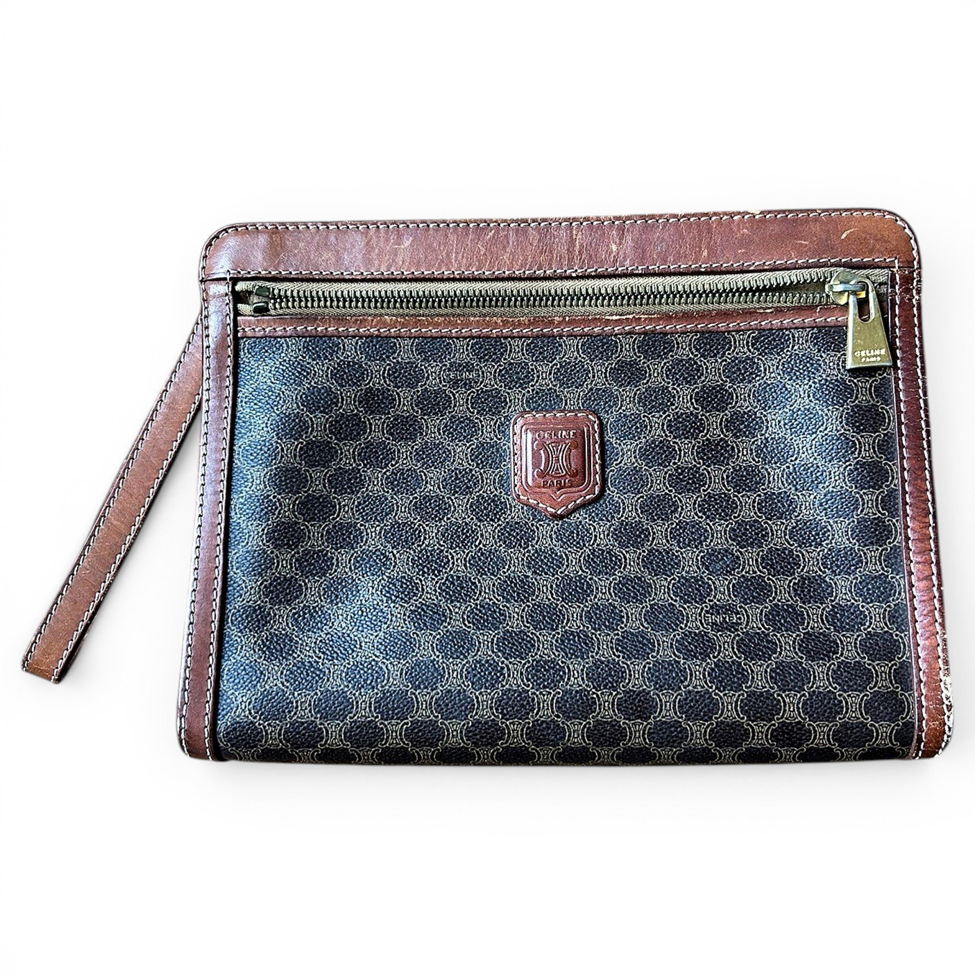 Triomphe Vintage leather clutch bag