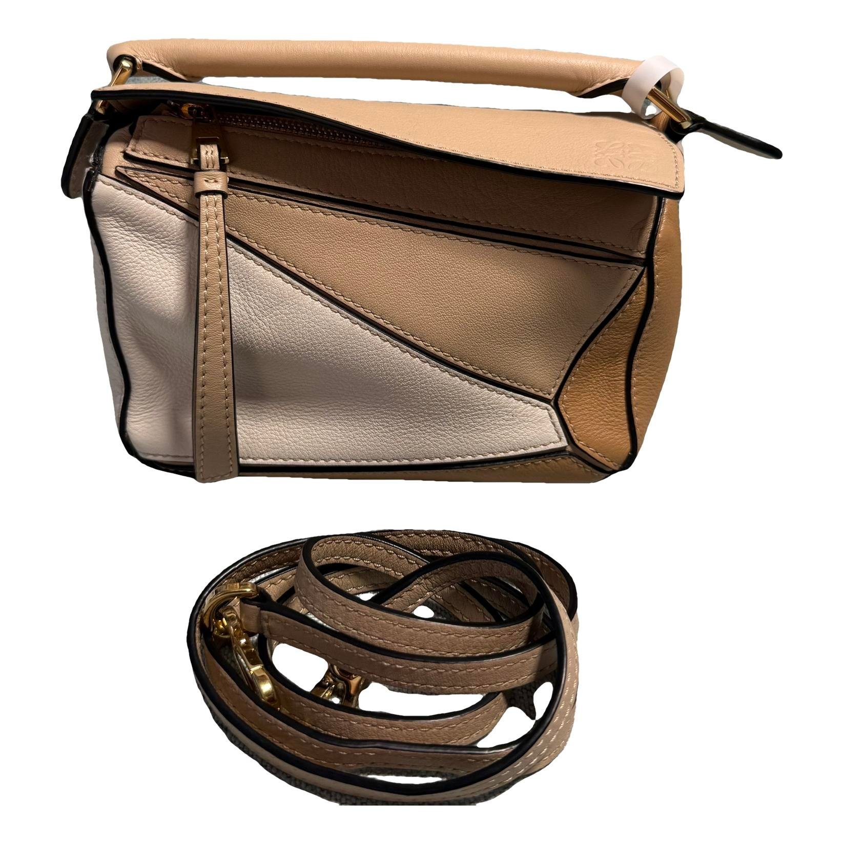 Puzzle leather handbag