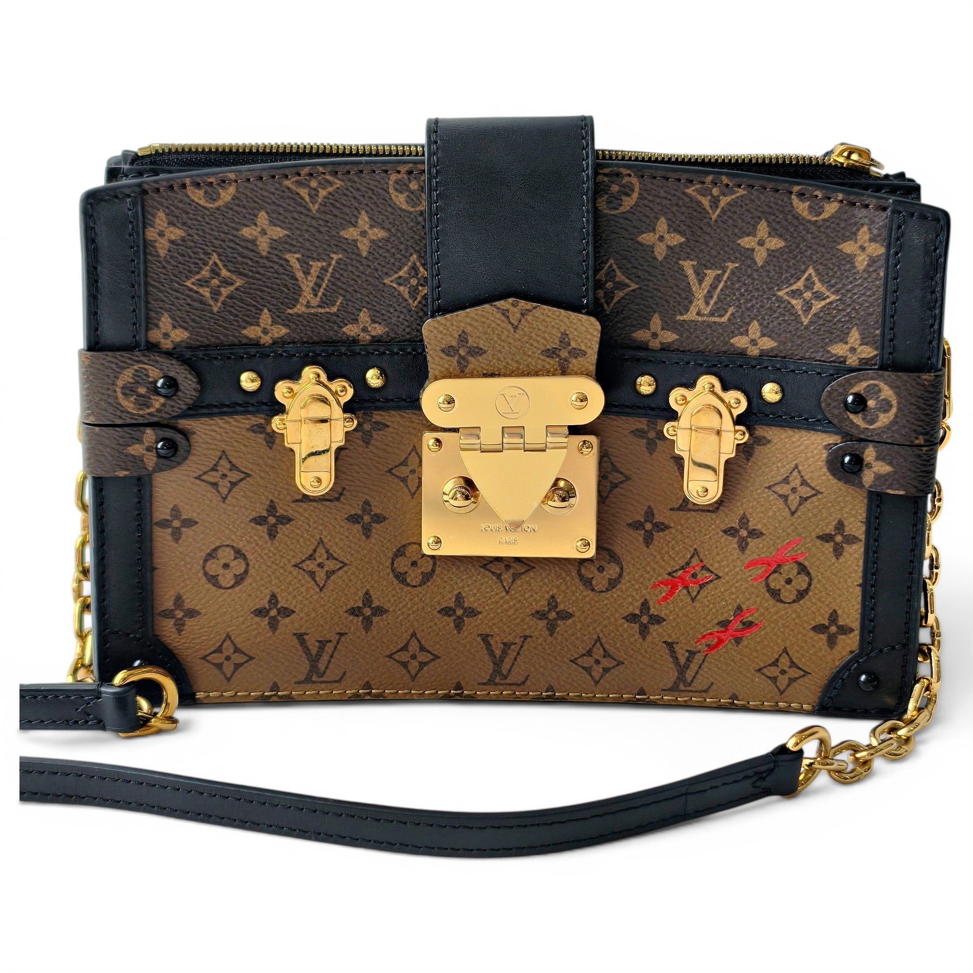 Pochette Trunk leather handbag