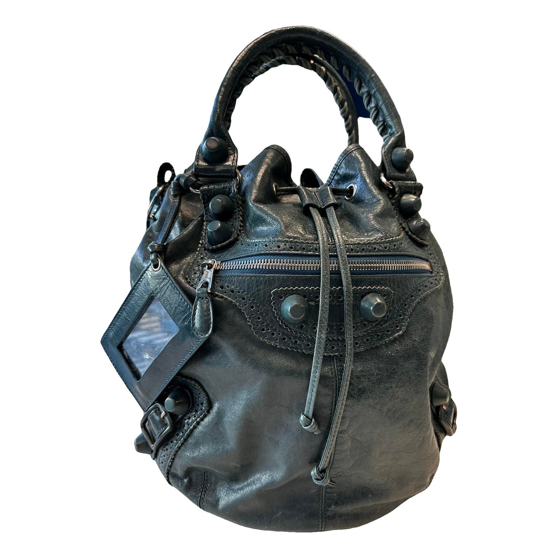 Pompon leather handbag
