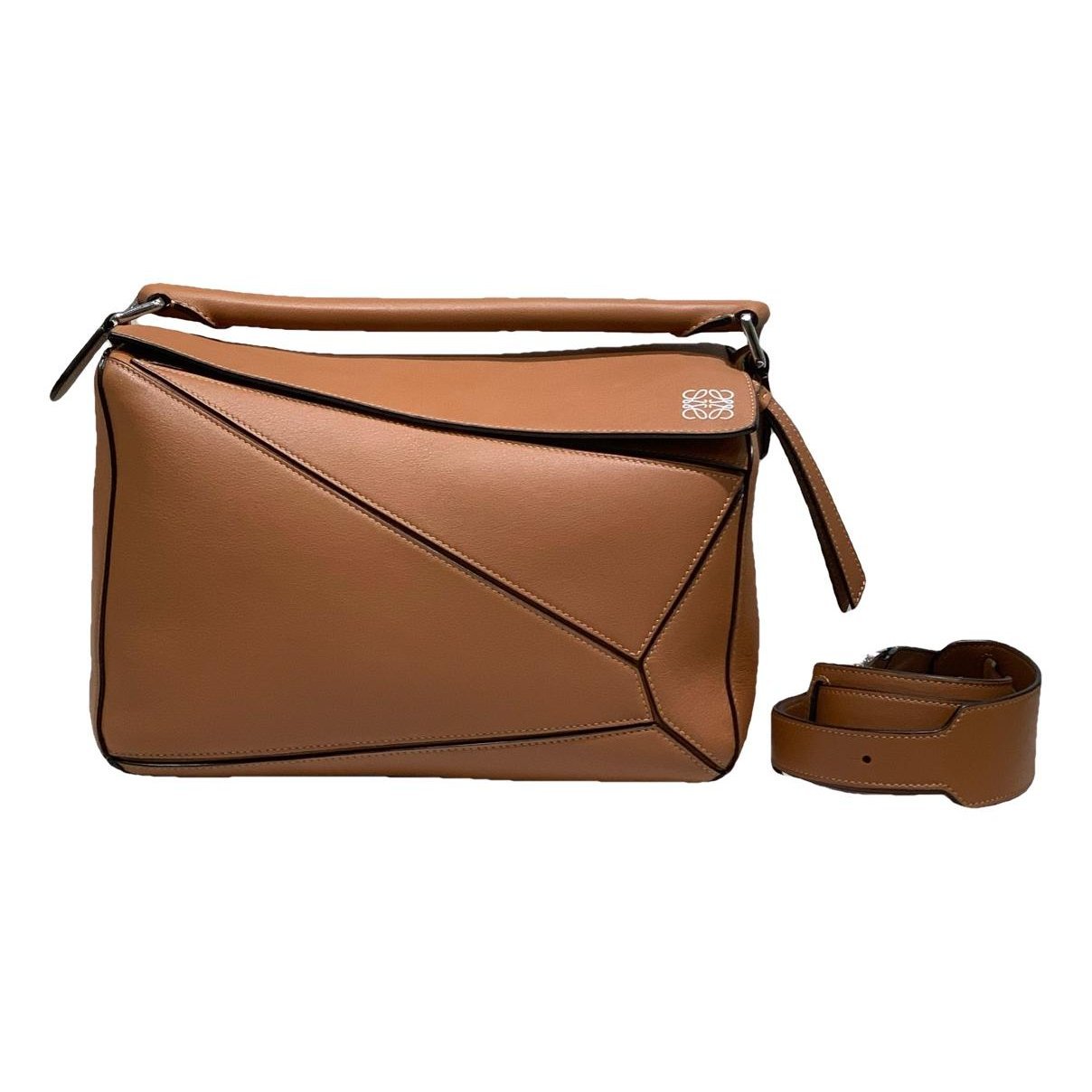 Puzzle leather handbag