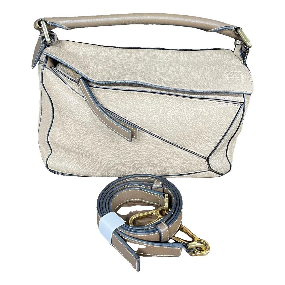 Puzzle leather handbag