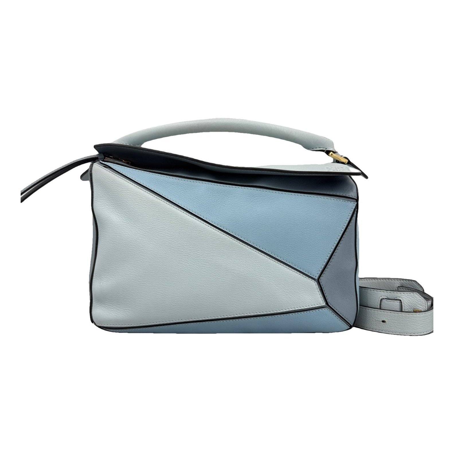 Puzzle leather handbag