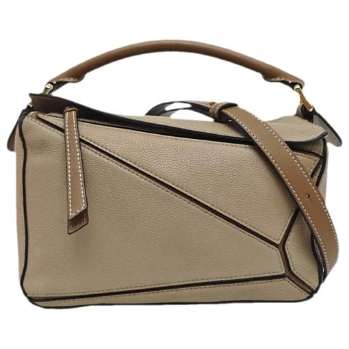 Puzzle leather handbag