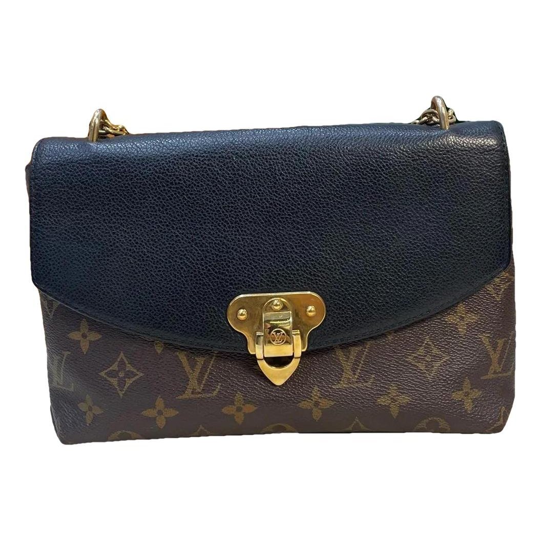 Maxi Multi Pochette Accessoires leather mini bag