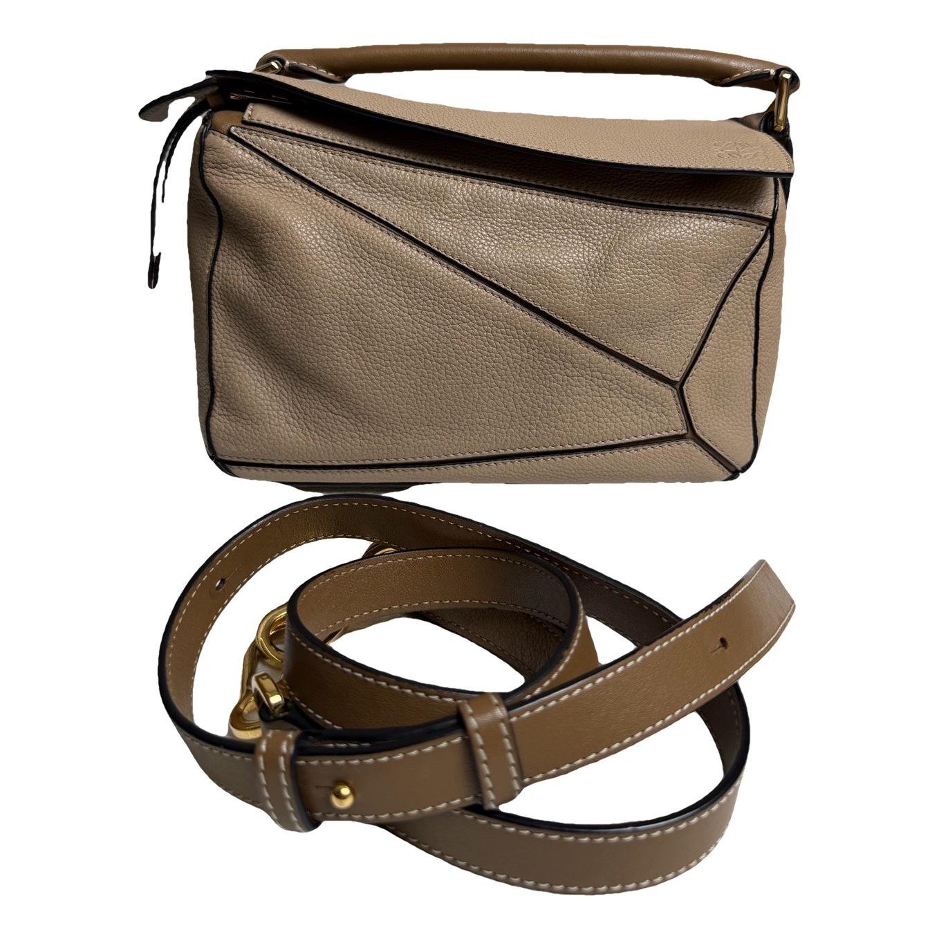 Puzzle leather handbag