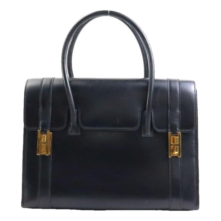 Drag leather handbag