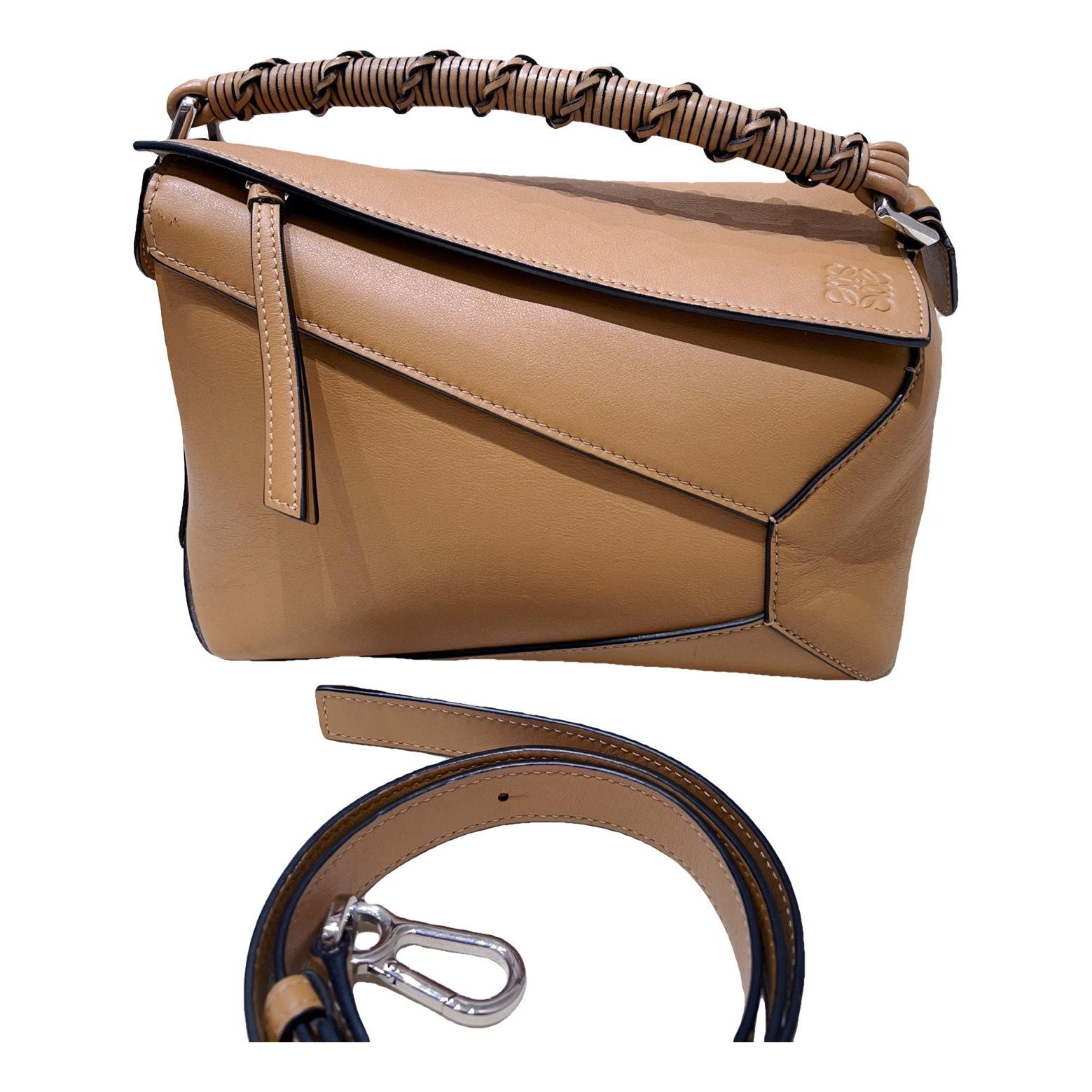 Puzzle leather handbag