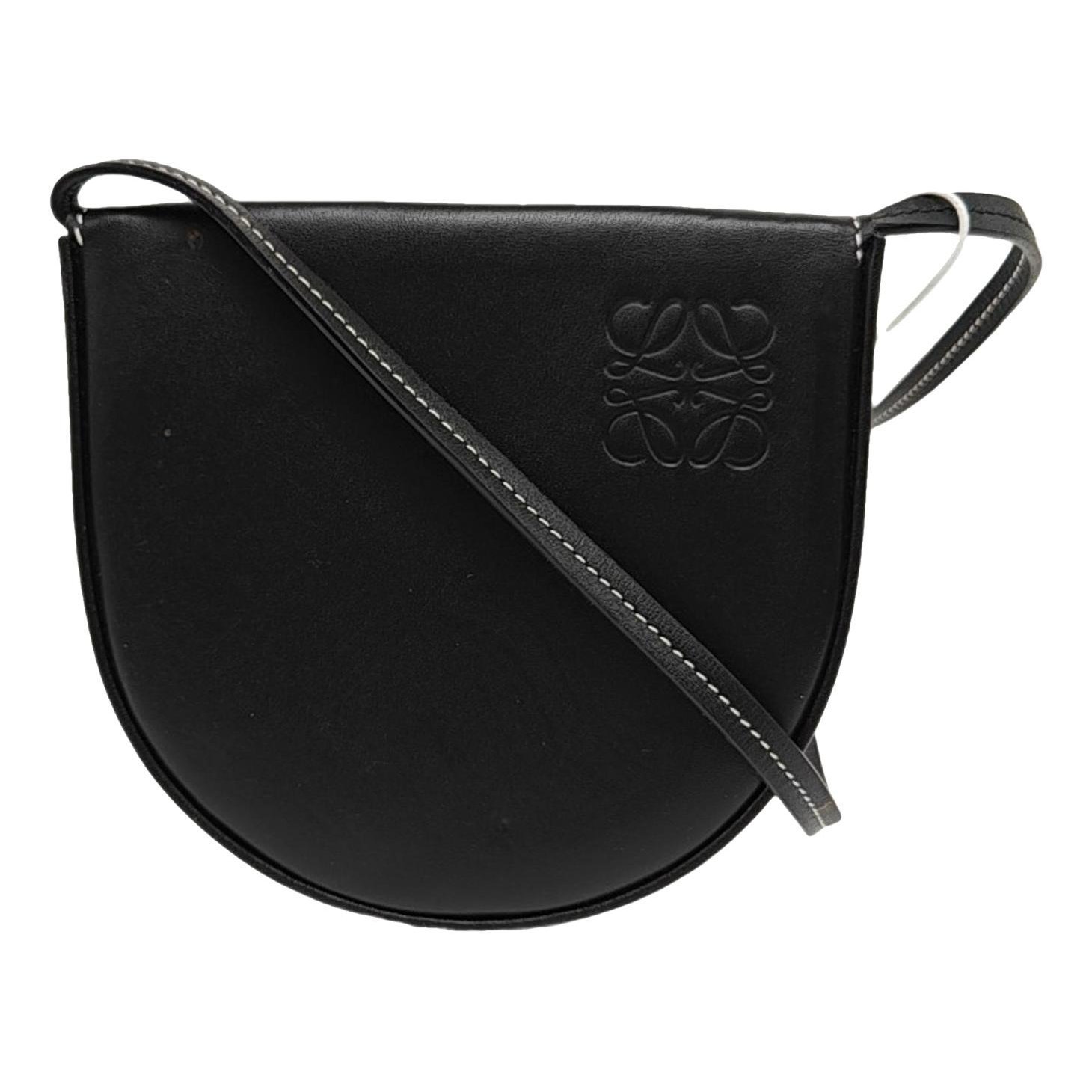Heel leather handbag