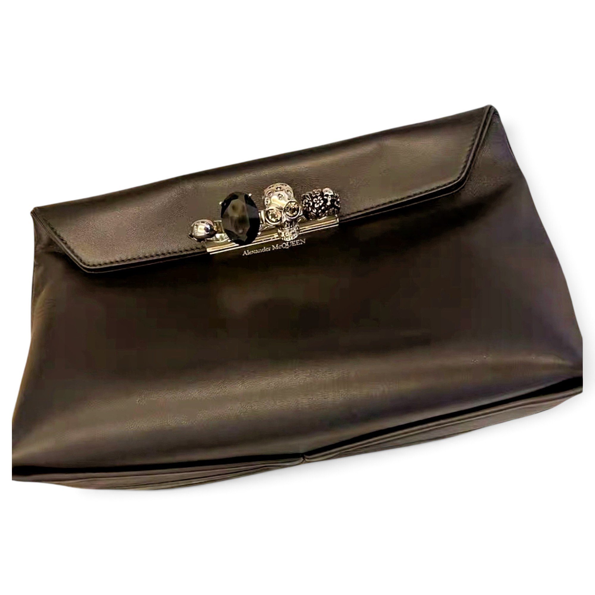 Knuckle leather clutch bag