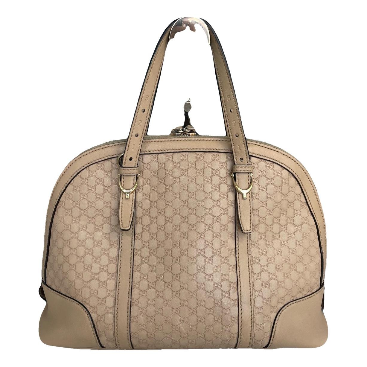 Dôme leather handbag