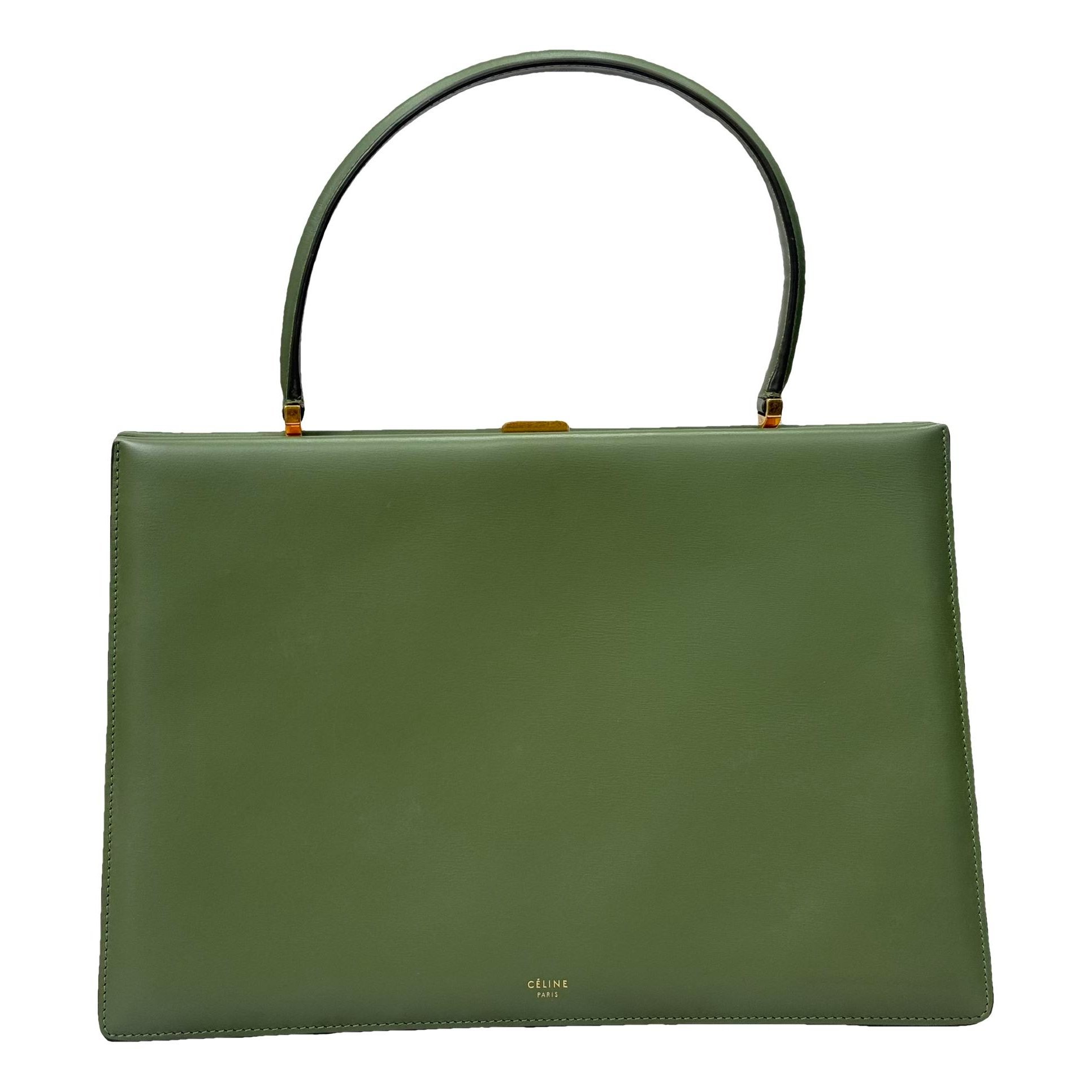 Clasp leather handbag