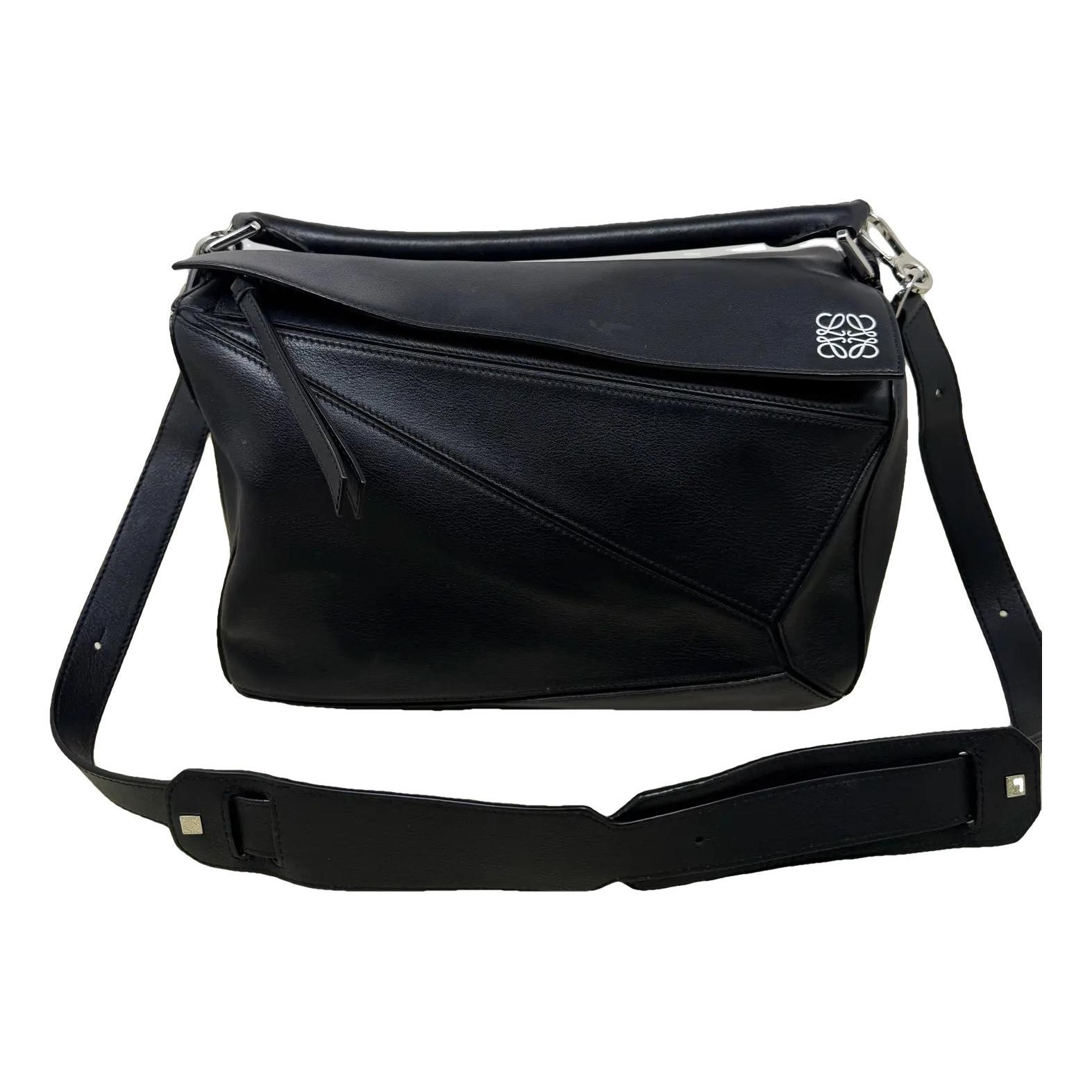 Puzzle leather handbag