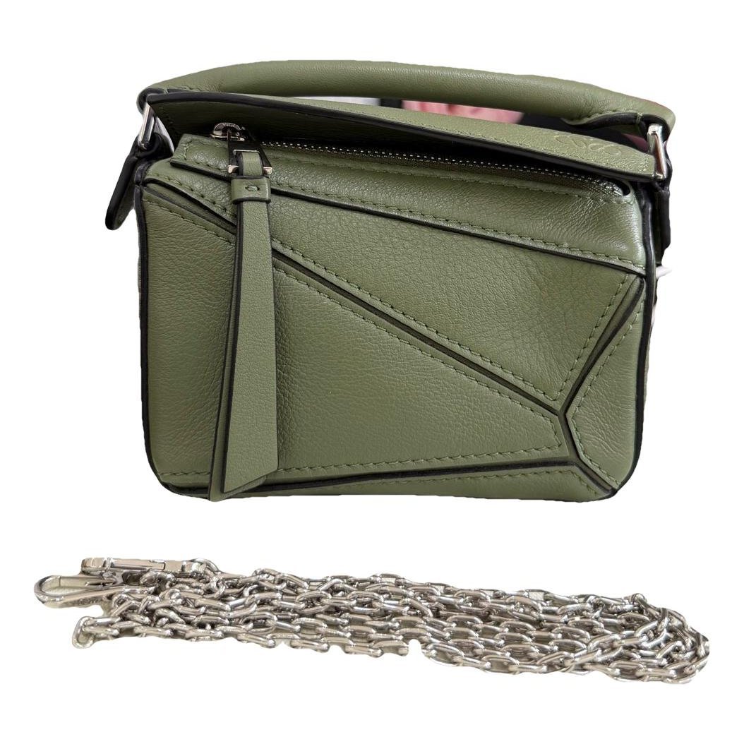 Puzzle leather handbag
