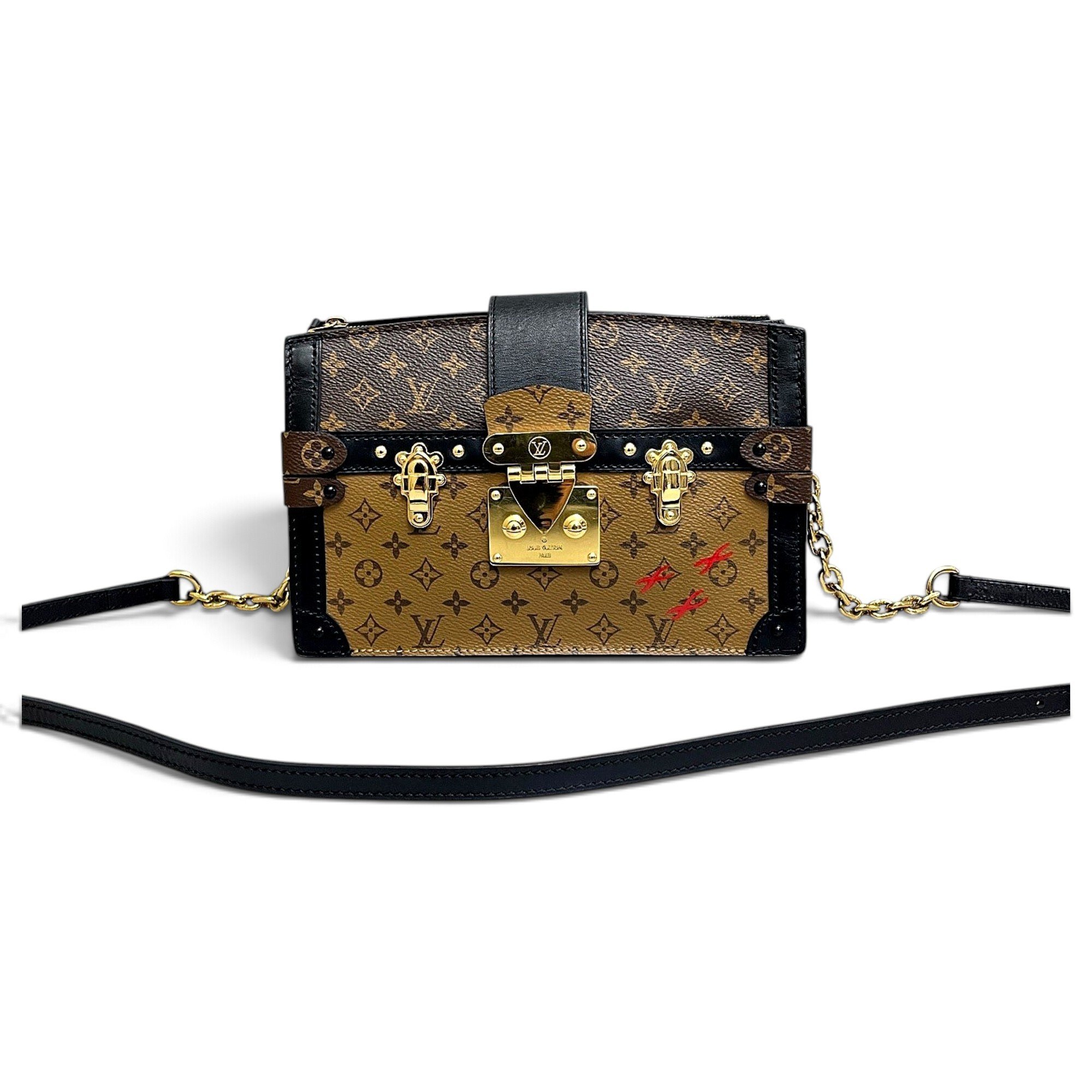 Pochette Trunk leather handbag