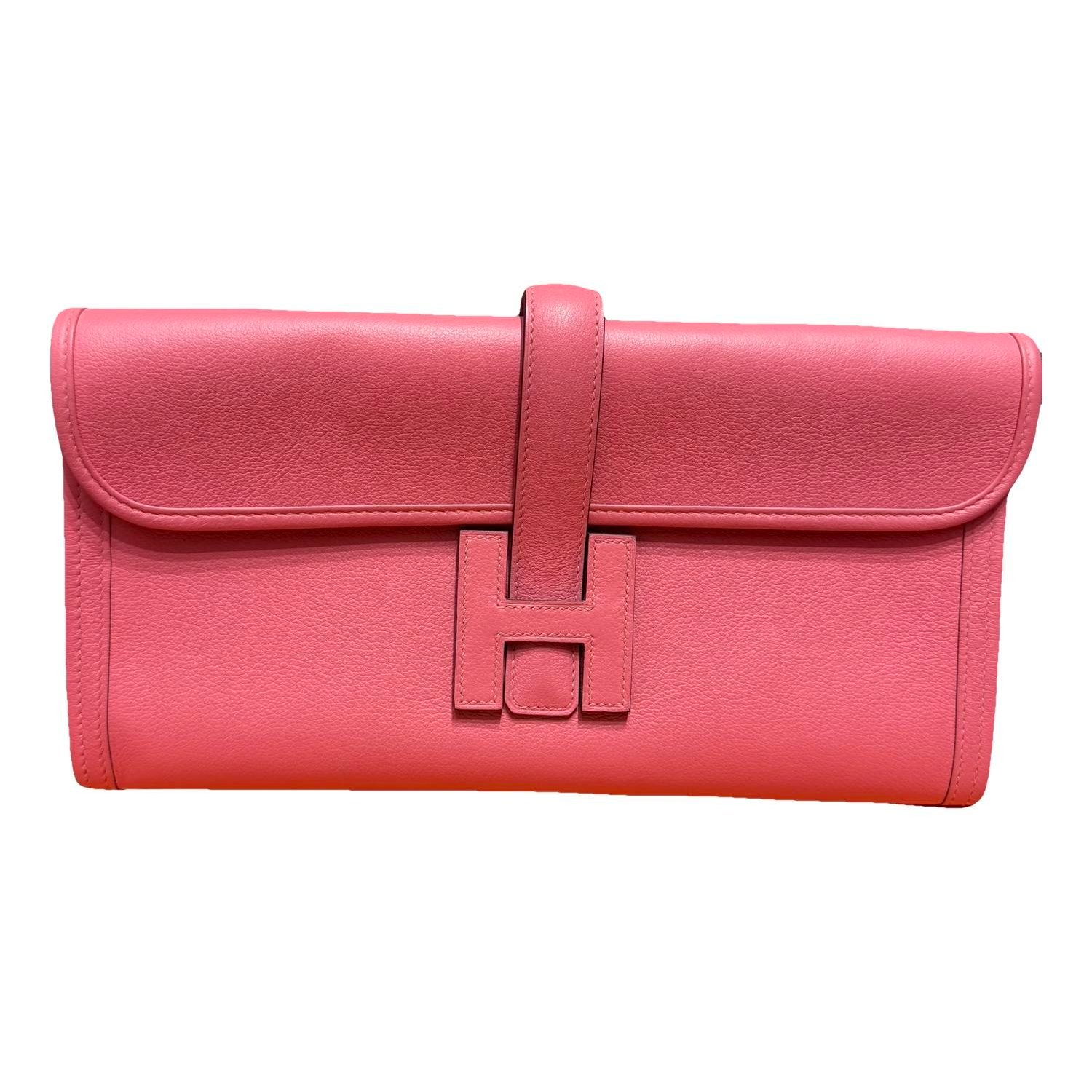 Jige leather clutch bag