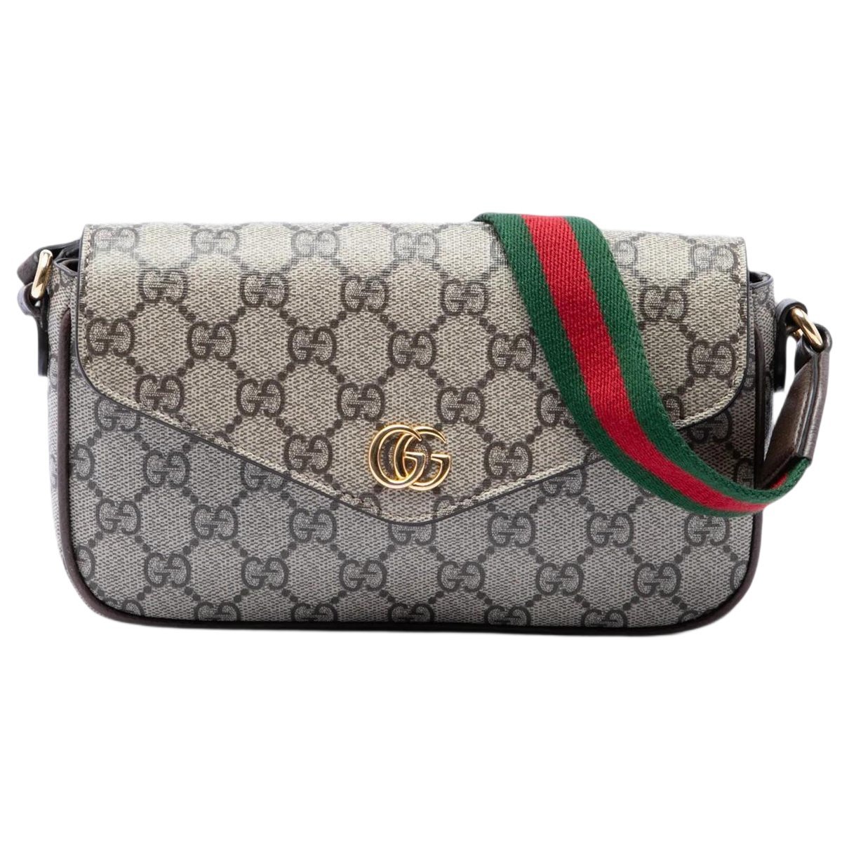 Ophidia cloth clutch bag