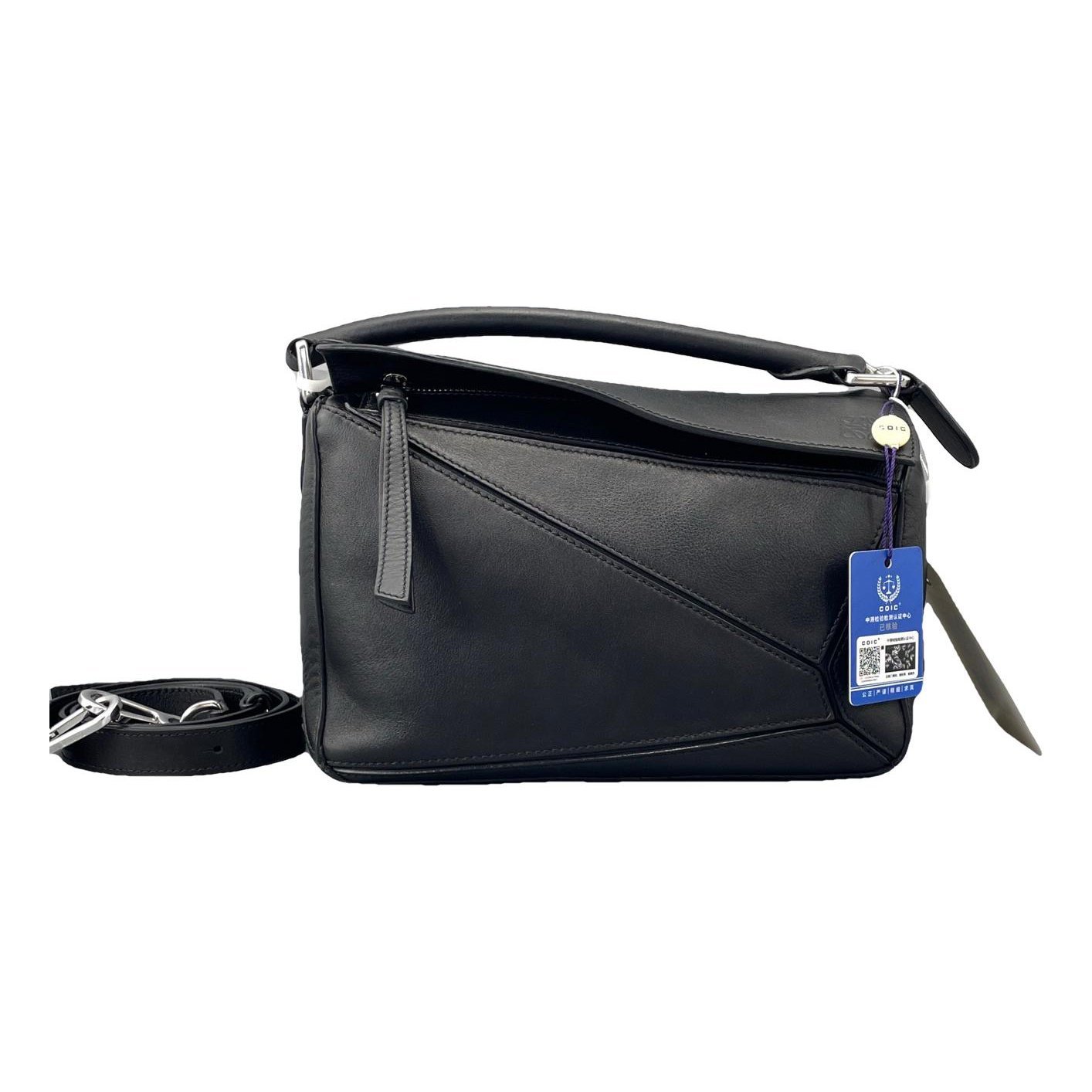 Puzzle leather handbag