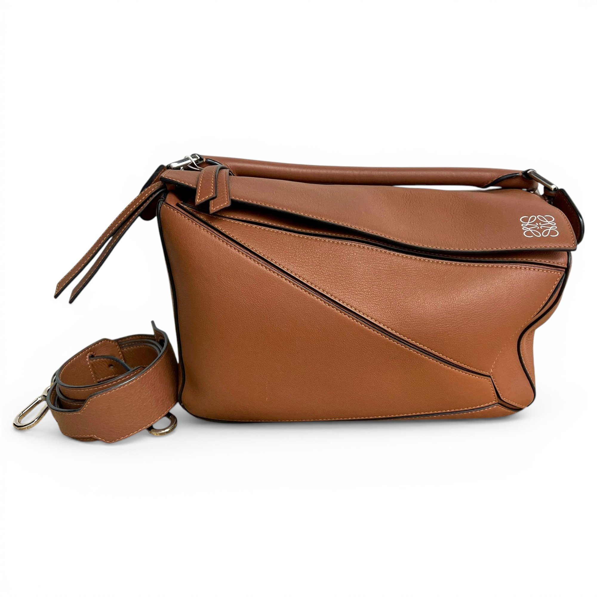 Puzzle leather handbag