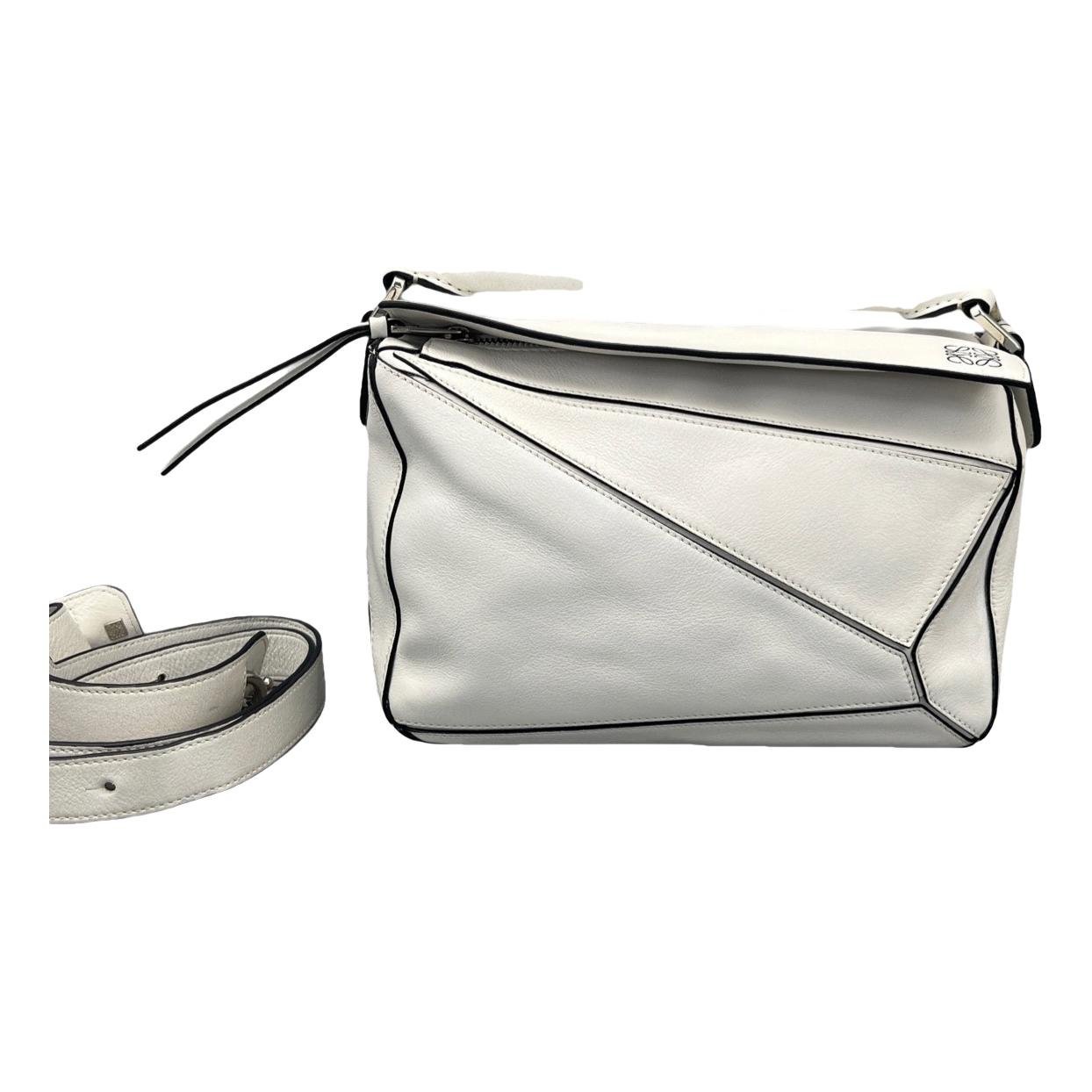 Puzzle leather handbag