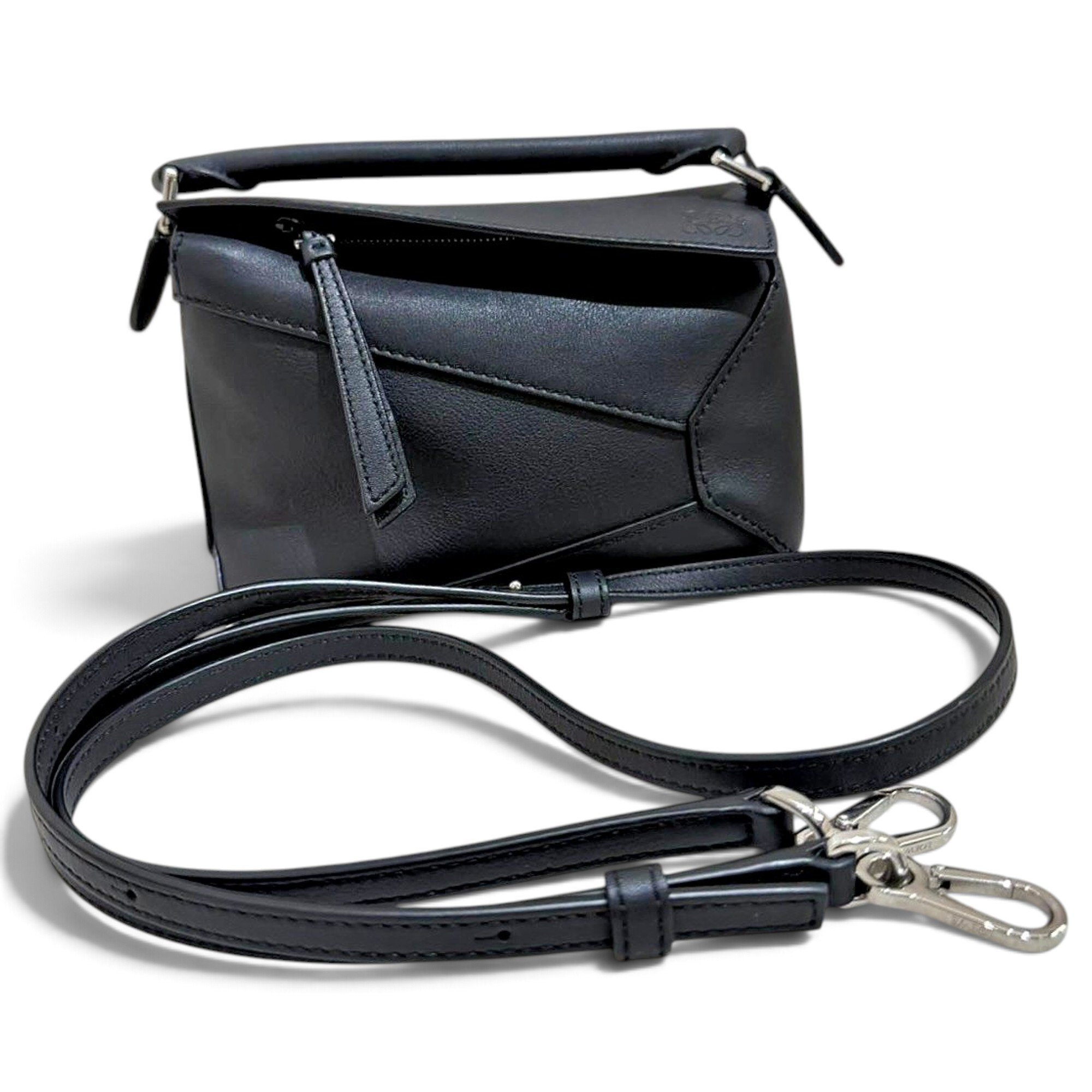 Puzzle leather handbag