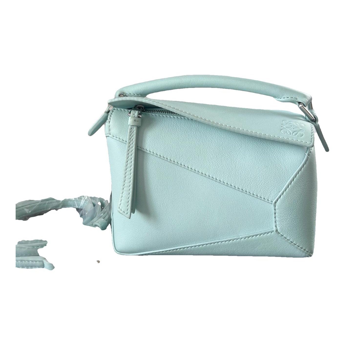 Puzzle leather crossbody bag