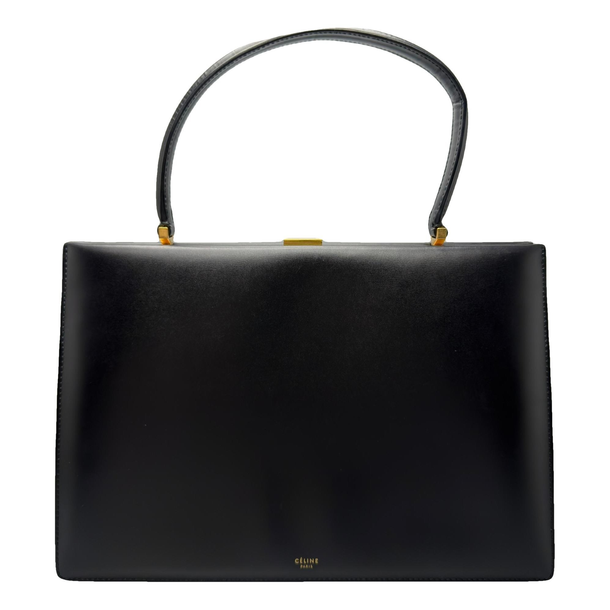 Clasp leather handbag